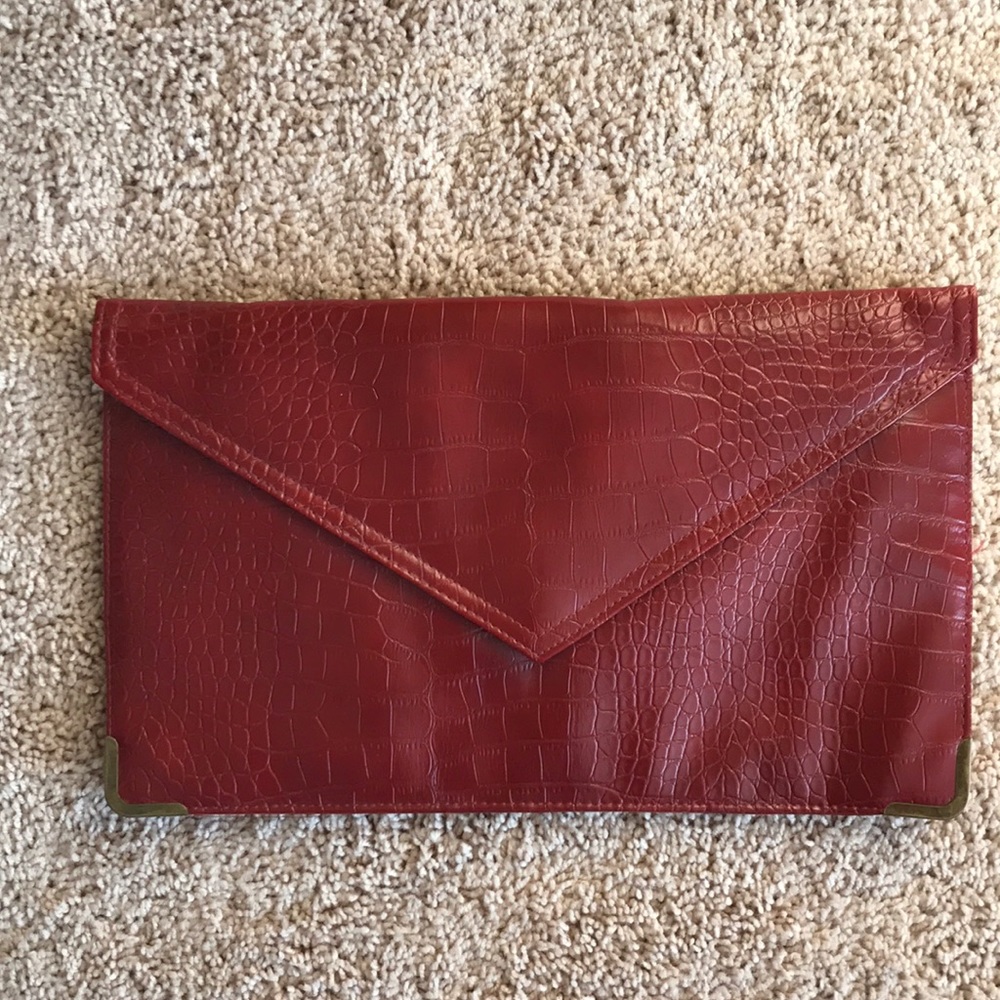 Red croc embossed clutch